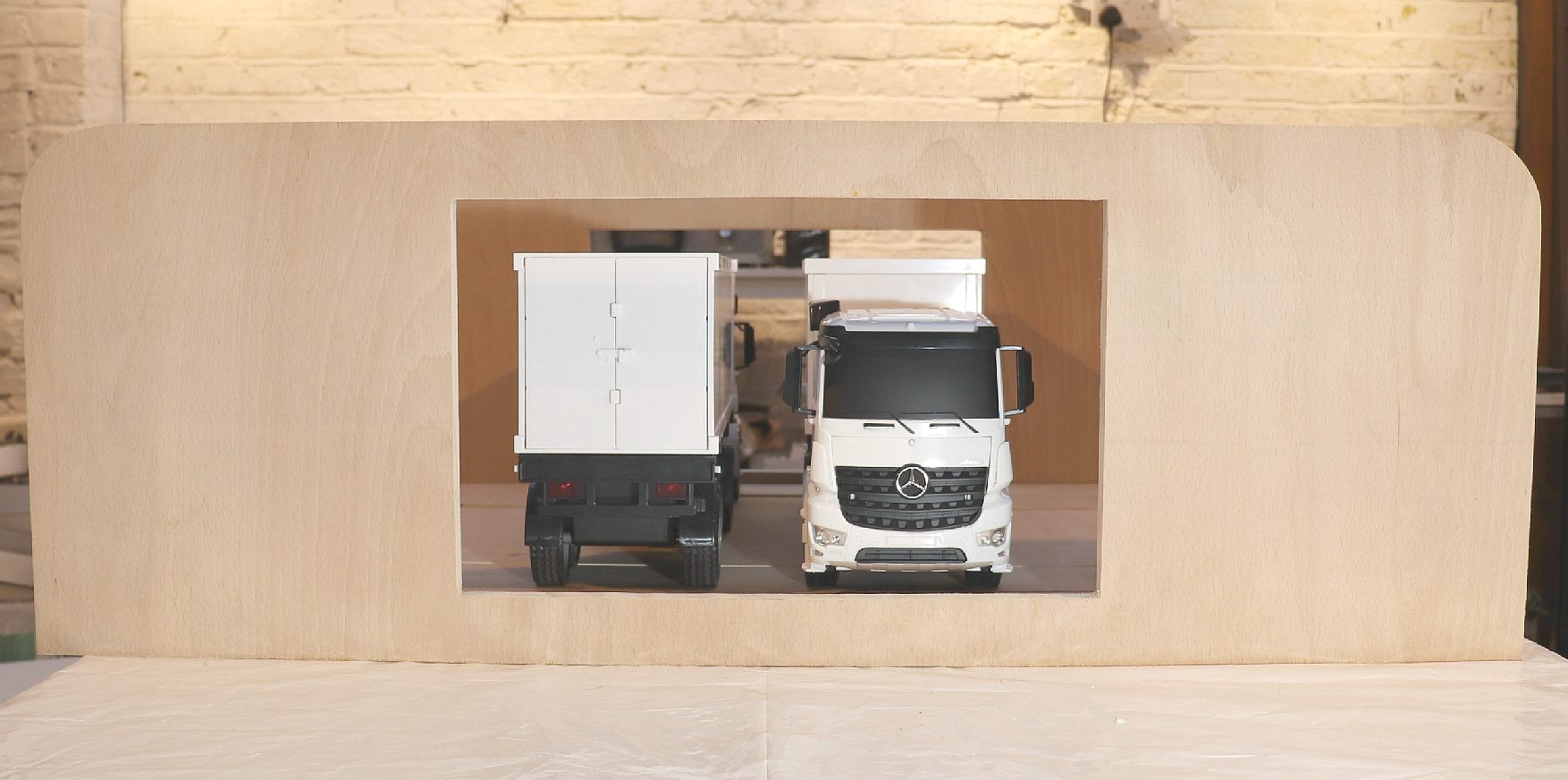 1:20th scale model of an electric truck service station using instant cartridge refuelling